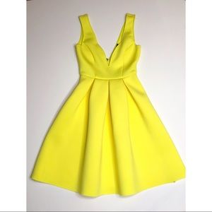 Bright yellow scuba cocktail dress